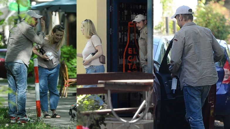 Bartłomiej Topa z żoną kupują butelkę czerwonego wina