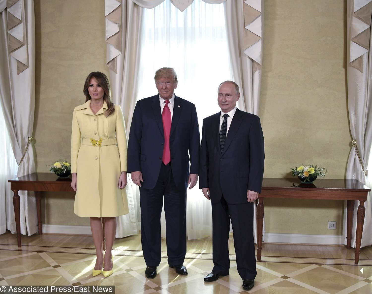 Melania Trump w żółtej sukience Gucci na spotkaniu z Władimirem Putinem