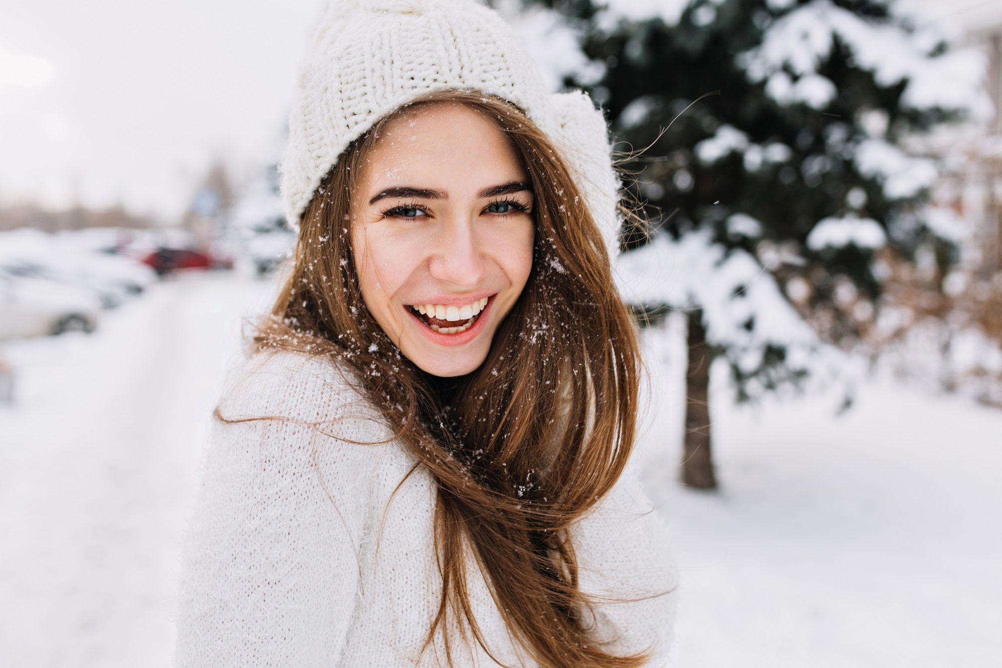Spectacular long-haired woman laughing while posing on snow background. Outdoor close-up photo of caucasian female model with romantic smile chilling in park in winter day..Spectacular long-haired woman laughing while posing on snow background. Outdoor close-up photo of caucasian female model with romantic smile chilling in park in winter day.Liana Dudnikwoman, face, winter, snow, beautiful, fun, beauty, female, young, cold, portrait, happy, adult, smile, white, hat, girl, person, background, outdoor, youth, frost, weather, cool, one, people, fashion, caucasian, attractive, hair, park, pretty, model, frozen, closeup, wind, city, wear, holiday, freedom, snowflake, expression, street, nature, leisure, relax, rest, weekend, blonde, european, woman, face, winter, snow, beautiful, fun, beauty, female, young, cold, portrait, happy, adult, smile, white, hat, girl, person, background, outdoor, youth, frost, weather, cool, one, people, fashion, caucasian, attractive, hair, park, pretty, model, frozen, closeup, wind, city, wear, holiday, freedom, snowflake, expression, street, nature, leisure, relax, rest, weekend, blonde, european