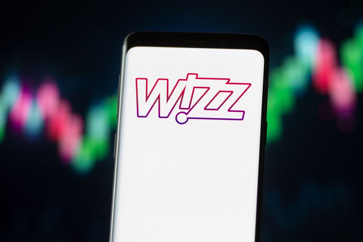 POLAND - 2020/11/04: In this photo illustration a Wizz Air logo seen displayed on a smartphone. (Photo Illustration by Mateusz Slodkowski/SOPA Images/LightRocket via Getty Images)