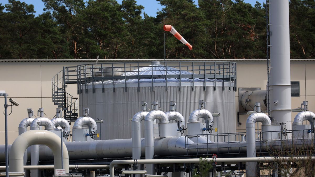 A windsock indicates wind direction above a storage tank at the gas receiving compressor station of the Nord Stream 1 natural gas pipeline in Lubmin, Germany, on Monday, July 11, 2022. Russian natural gas shipments to Europe via the Nord Stream pipeline to Germany are due to stop on Monday because of planned annual maintenance. Photographer: Krisztian Bocsi/Bloomberg via Getty Images