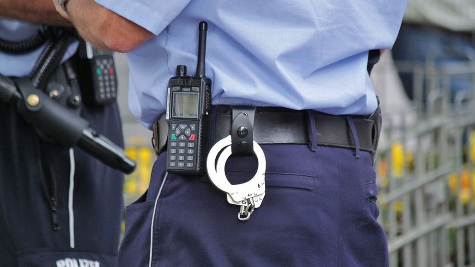 Free police officer photo, public domain guard CC0 image.

More:

 View public domain image source here
security guard, police, police officers, security officer, crime handcuffs, security, police man, uniform, guard, security man, uniform security, monitoring