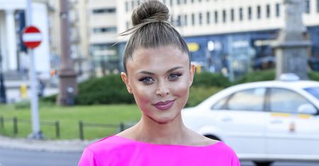 Joanna Opozda w neonowej sukience mini. Tak wyglądała na otwarciu nowego butiku