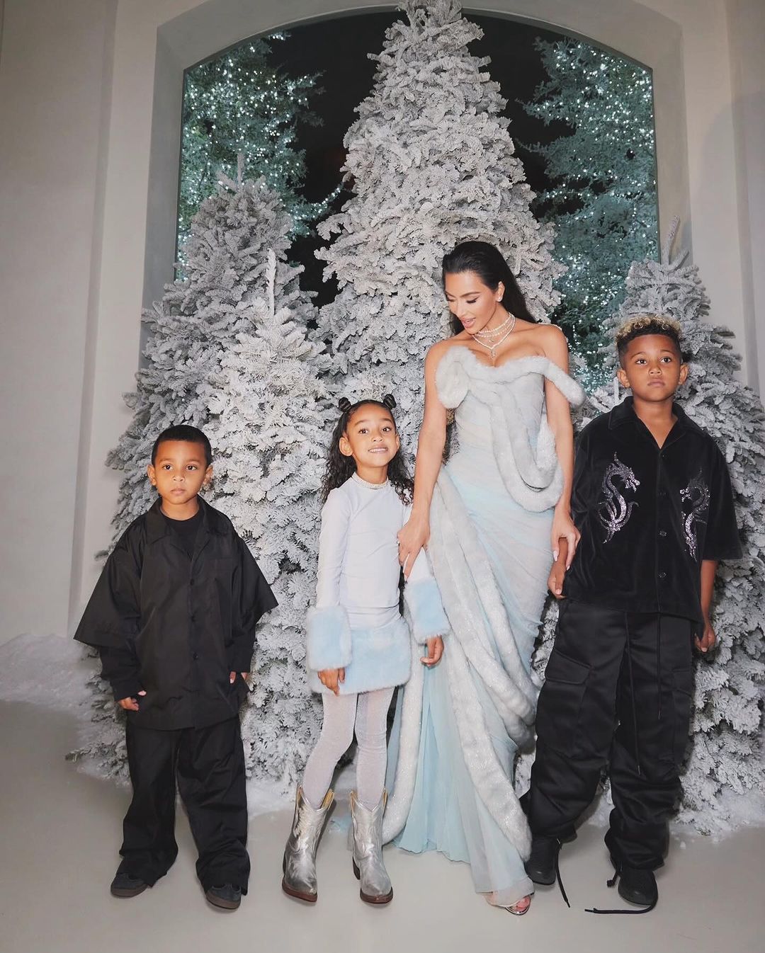 Kim Kardashian with children at the holiday party