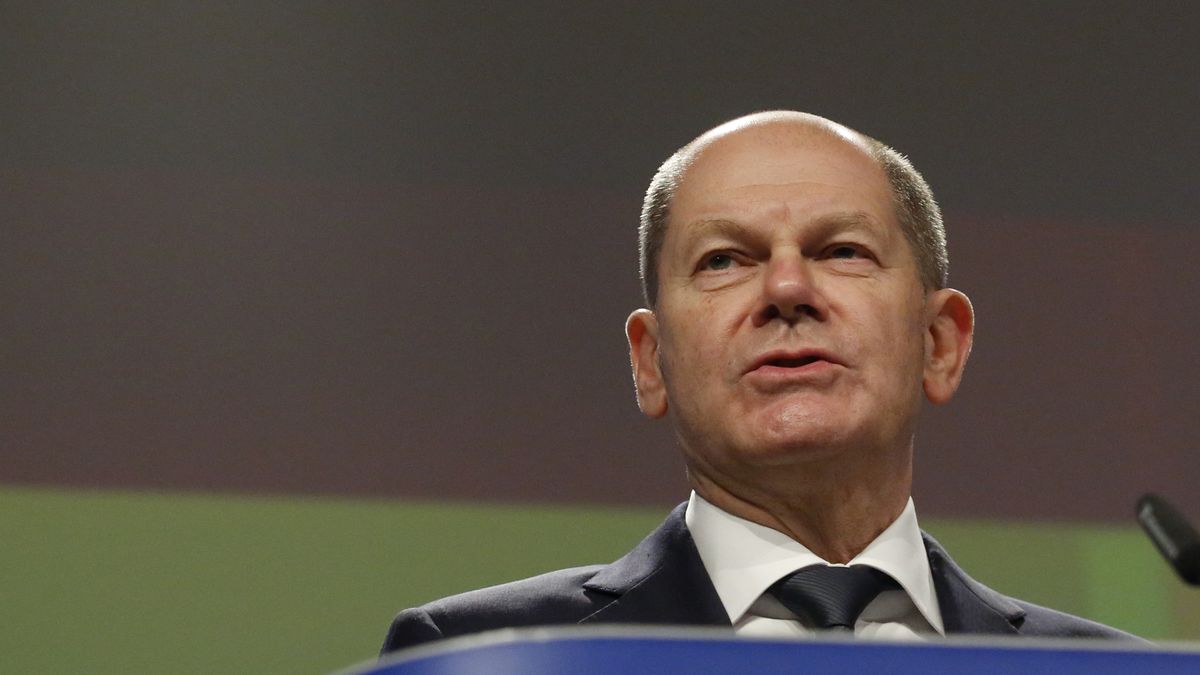 Olaf Scholz, Germany's chancellor, speaks at a news conference at the European Union (EU) headquarters in Brussels, Belgium, on Friday, Dec. 10, 2021. Scholz said a Russian invasion of Ukraine would trigger reprisals, the latest warning to President Vladimir Putin from Western leaders, though he declined to specify if halting the Nord Stream 2 gas pipeline would be part of any response. Photographer: Valeria Mongelli/Bloomberg via Getty Images