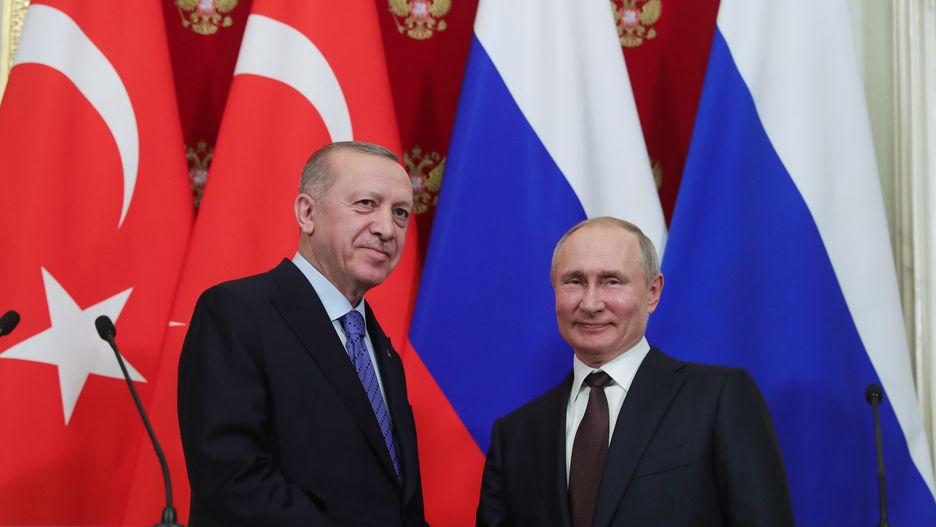 MOSCOW, RUSSIA - MARCH 5: President of Turkey Recep Tayyip Erdogan (L) and President of Russia Vladimir Putin (R) shake hands at the end of a joint news conference following an inter-delegation meeting at Kremlin Palace in Moscow, Russia on March 5, 2020. (Photo by Mustafa Kamaci/Anadolu Agency via Getty Images)