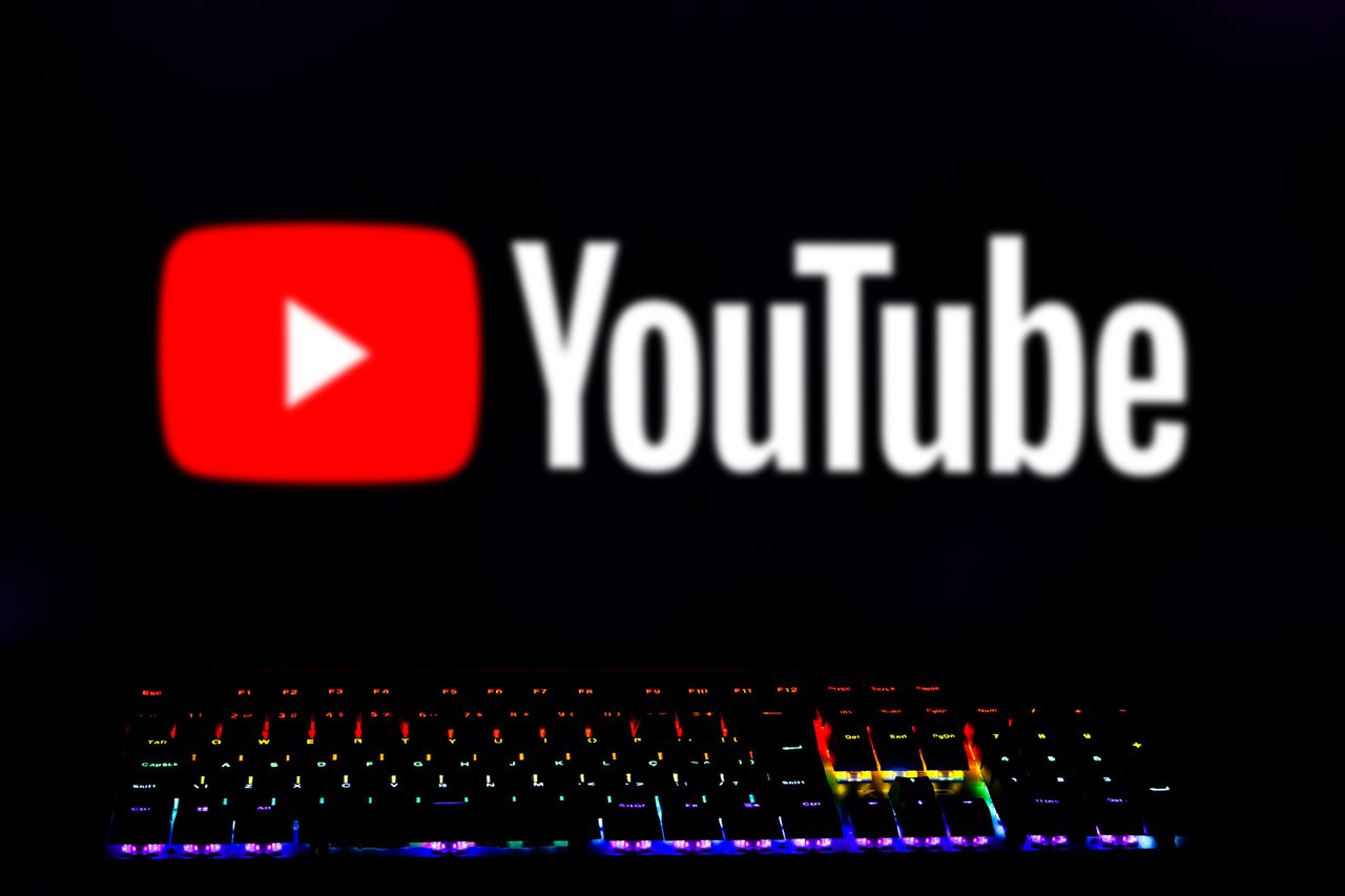 BRAZIL - 2024/04/15: In this photo illustration, the YouTube logo is displayed on the computer screen with a keyboard of colored lights. (Photo Illustration by Rafael Henrique/SOPA Images/LightRocket via Getty Images)