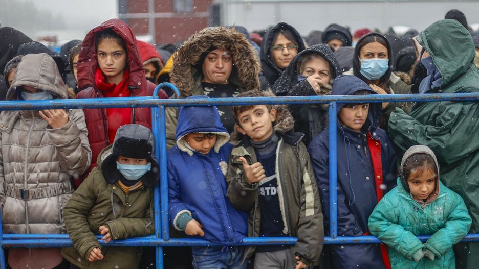Uchod?cy w  centrum logistycznym Bruzgi w poblizu granicy polsko-bia?oruskiejGRODNO REGION, BELARUS - NOVEMBER 27: Migrants receive humanitarian aid donated by Grodno people as migrants continue to wait at a closed area allocated by Belarusian government the Belarusian-Polish border in Grodno, Belarus on November 27, 2021. The migrant crisis on the border of Belarus with Poland, Lithuania, and Latvia escalated on November 8. This year, Polish border guards have prevented more than 35,000 attempts to illegally cross the Polish-Belarusian border, which is 400 times more than last year. Sefa Karacan / Anadolu Agency/ABACAPRESS.COMAA/ABACA