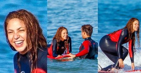 Uśmiechnięta Shakira uczy się surfingu z synami pod okiem przystojnego instruktora (ZDJĘCIA)