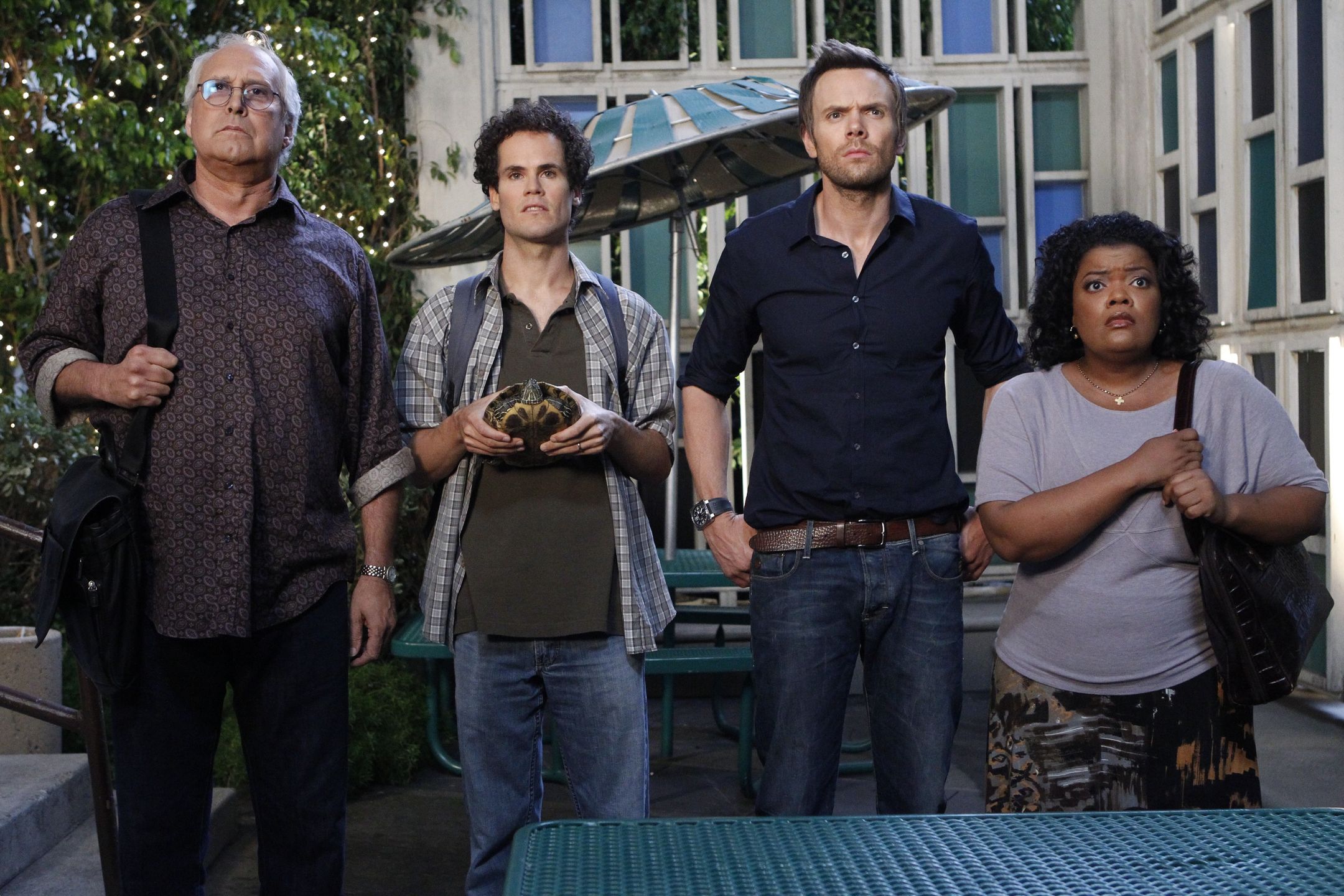 Community - Season 3COMMUNITY -- "Competitive Ecology" Episode 304 -- Pictured: (l-r) Chevy Chase as Pierce, David Neher as Todd, Joel McHale as Jeff, Yvette Nicole Brown as Shirley -- (Photo by: Jordin Althaus/NBCU Photo Bank/NBCUniversal via Getty Images via Getty Images)NBCNUP_146269, 2010s, 2011-2012, Air Date 10/06/2011, color image, episodic, NBCU Photo Bank, Season 3, select, Comedy, animal, turtle, Horizontal, outdoor, Group