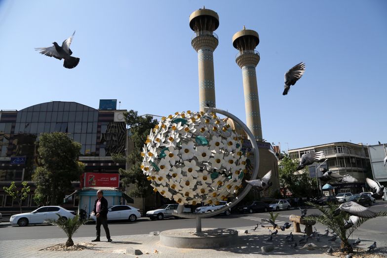 TEHRAN, IRAN - APRIL 19: People walk on the streets of Tehran as they continue their daily lives after the explosions heard in Isfahan and Tabriz cities of Iran, in Tehran, Iran on April 19, 2024. The sounds were heard due to the activation of the air defense system and the destruction of 3 mini unmanned aerial vehicles (UAV), Iranian media reported. (Photo by Fatemeh Bahrami/Anadolu via Getty Images)