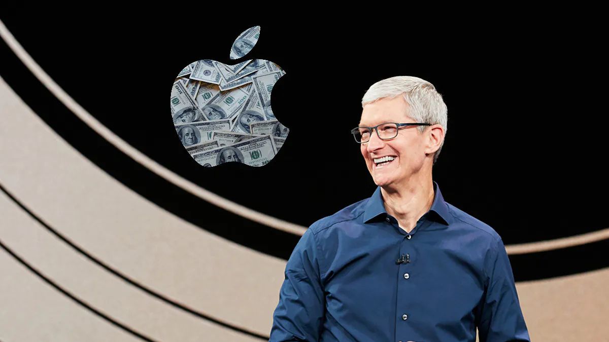 Na zdjęciu Tim Cook na tle logo Apple'a