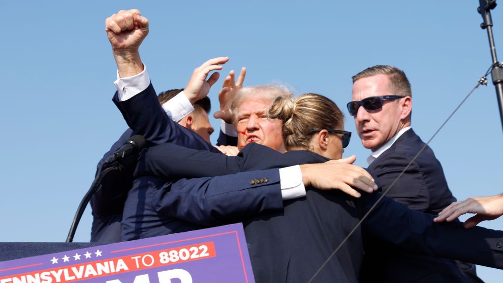 Donald Trump Injured During Shooting At Campaign Rally In Butler, PA
BUTLER, PENNSYLVANIA - JULY 13: Republican presidential candidate former President Donald Trump is rushed offstage during a rally on July 13, 2024 in Butler, Pennsylvania. Butler County district attorney Richard Goldinger said the shooter is dead after injuring former U.S. President Donald Trump, killing one audience member and injuring another in the shooting. (Photo by Anna Moneymaker/Getty Images)
Anna Moneymaker
bestof, topix