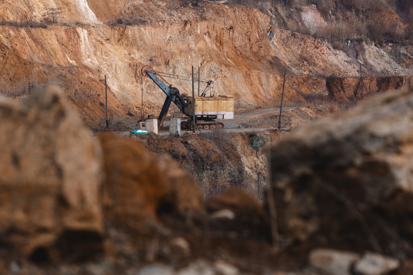 KIROVOHRAD, UKRAINE - FEBRUARY 28: A view of Zavalivskyi Graphite Plant, a Ukrainian enterprise specializing in the extraction of graphite ore and its processing for industrial needs in Zavallya, Kirovohrad Oblast, Ukraine on February 28, 2025. The open-pit mining has been in operation since 1964. Currently, graphite, garnet, and granite are being extracted from the quarry. According to estimates, graphite reserves amount to 7,420,000 tons, garnet reserves to 3,000,000 tons, which will be sufficient for 15 years of mining. After that, the quarry area may be expanded. As of now, the quarry depth is about 120 meters. The plant produces around 10 types of graphite for various applications, including powder metallurgy, brake pads, usage in polymer materials such as composite plates for bulletproof vests , and lithium-ion batteries for phones, electric vehicles, and more. The plant's facilities can process up to 100-150 tons of graphite per day. (Photo by Arsen Dzodzaiev/Anadolu via Getty Images)
