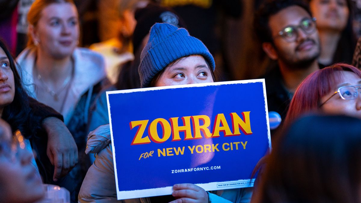 NEW YORK, NEW YORK - NOVEMBER 4: Supporters watch as Zohran Mamdani delivers a speech following his mayoral victory at an election-night watch party at the Bohemian Hall & Beer Garden on November 4, 2025 in the Queens borough of New York City. The watch party was one of many hosted by the New York City chapter of the Democratic Socialists of America in support of Mamdani. (Photo by Jeremy Weine/Getty Images)