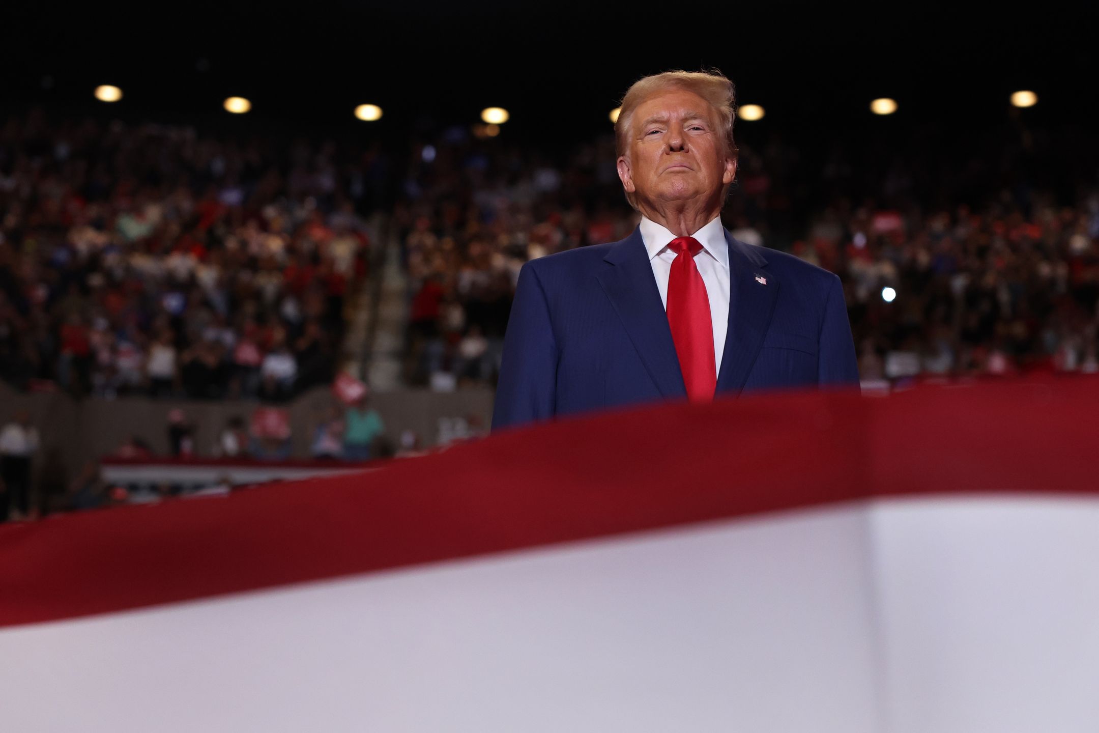 UNIONDALE, NEW YORK - SEPTEMBER 18: Republican presidential nominee, former U.S. President Donald Trump  speaks at an evening rally in Uniondale on Long Island on September 18, 2024 in Uniondale, New York. Security at the event is tight following the arrest of an individual over the weekend hiding with a gun at Trump’s Florida golf course.  (Photo by Spencer Platt/Getty Images)