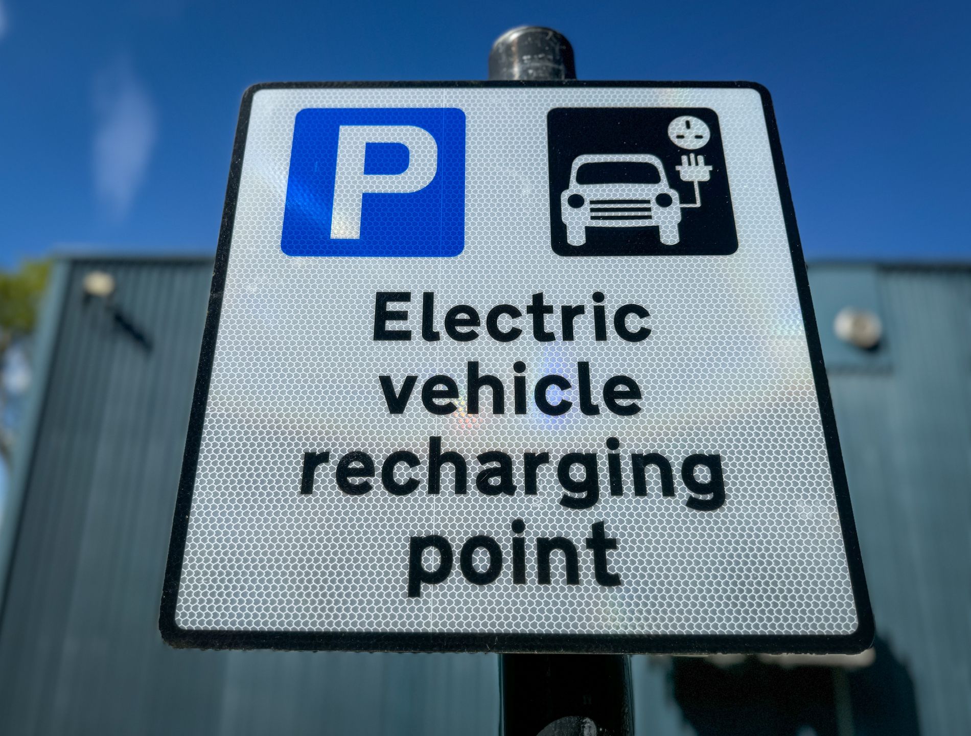 BATH, UNITED KINGDOM - APRIL 28: A electric vehicle charging point sign is displayed in a city centre car park, on April 28, 2024 in Bath, England. The government's commitment to reducing future Co2 carbon emissions will mean many more motorists will need to switch from petrol and diesel powered cars to electric (EV) driven ones. However there are also fears that the charging network in the UK is not yet fit to deal with the enormous demand more EVs on the road would place on it.(Photo by Matt Cardy/Getty Images)