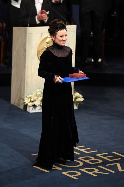 STOCKHOLM, SWEDEN - DECEMBER 10: Author Olga Tokarczuk, laureate of the Nobel Prize in Literature 2018 acknowledges applause after he received his Nobel Prize from King Carl XVI Gustaf of Sweden during the Nobel Prize Awards Ceremony at Concert Hall on December 10, 2019 in Stockholm, Sweden. (Photo by Pascal Le Segretain/Getty Images)