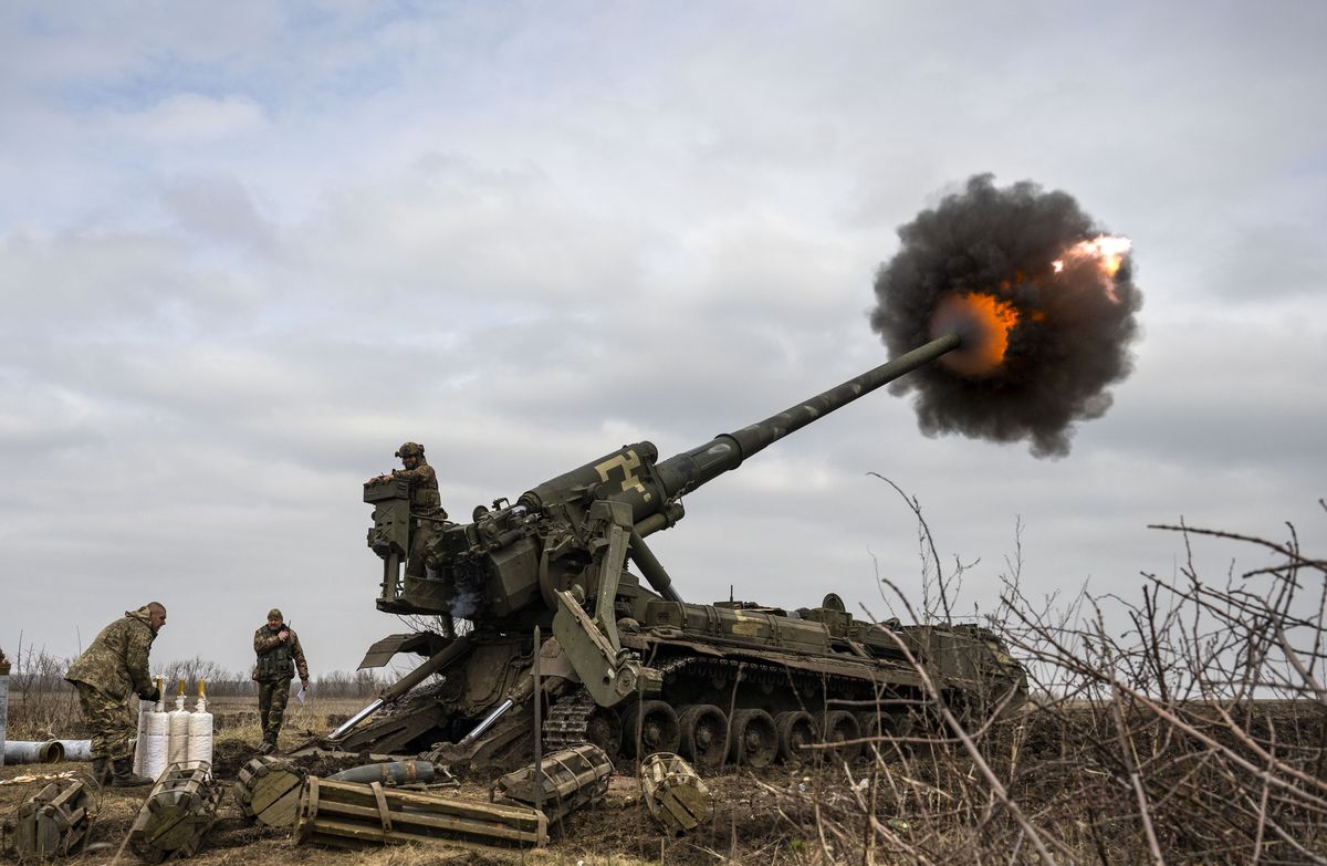 CHASIV YAR, DONETSK PROVINCE, UKRAINE - MARCH 17: Ukrainian servicemen fire an artillery called 2S7 Pion howitzer cannon aiming to Russian positions in the frontline nearby Bakhmut in Chasiv Yar, Ukraine on March 17, 2023. (Photo by Muhammed Enes Yildirim/Anadolu Agency via Getty Images)