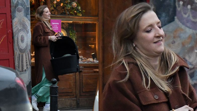 Lara Gessler zajada się pączkiem na ulicy 