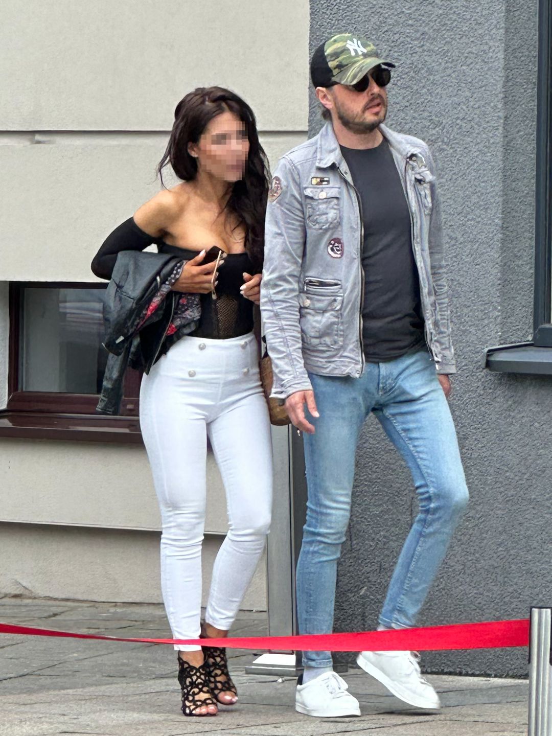 Piotr Cugowski z partnerką