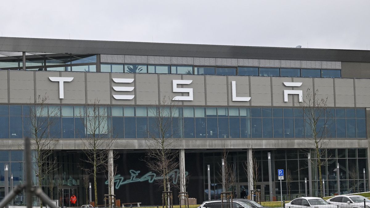 BERLIN, GERMANY - FEBRUARY 22: ''Tesla'' logo is seen on the Tesla factory building in Berlin, Germany on February 22, 2024. In the southeastern outskirts of Berlin, within the Grunheide district, local residents are expressing opposition to the expansion plans of the first automobile factory of US electric car manufacturer, Tesla in Europe. The proposed expansion has sparked discontent among the community members in the area. (Photo by Halil Sagirkaya/Anadolu via Getty Images)