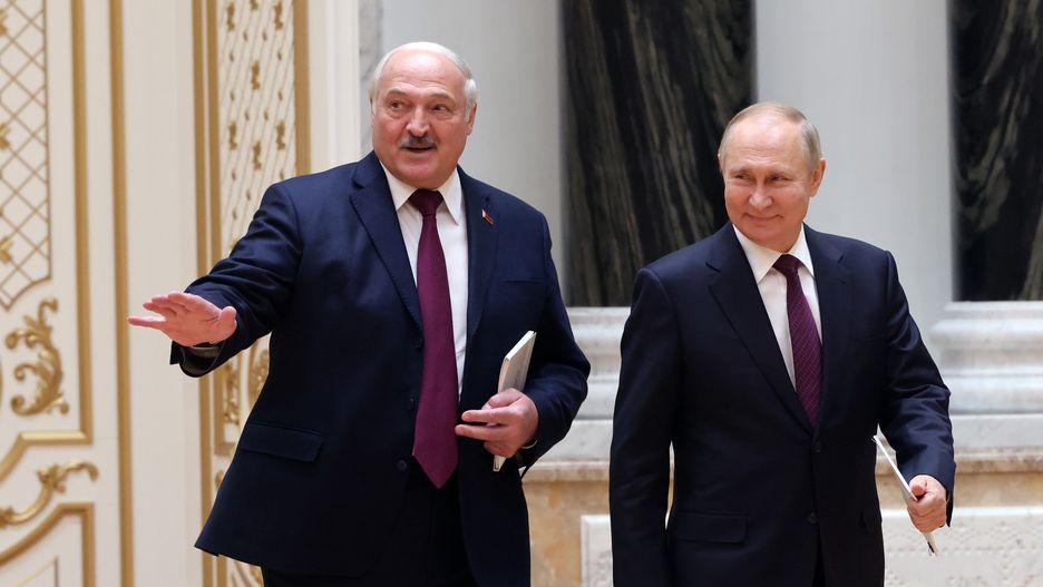 MINSK, BELARUS - DECEMBER 19: (RUSSIA OUT) Russian President Vladimir Putin (R) and Belarussian President Alexander Lukashenko (L) enter the hall during their joint press conference at the Palace of Independence, on December 19, 2022 in Minsk, Belarus. President Putin is having a one-day visit to Belarus to discuss military and economic cooperation. (Photo by Contributor/Getty Images)