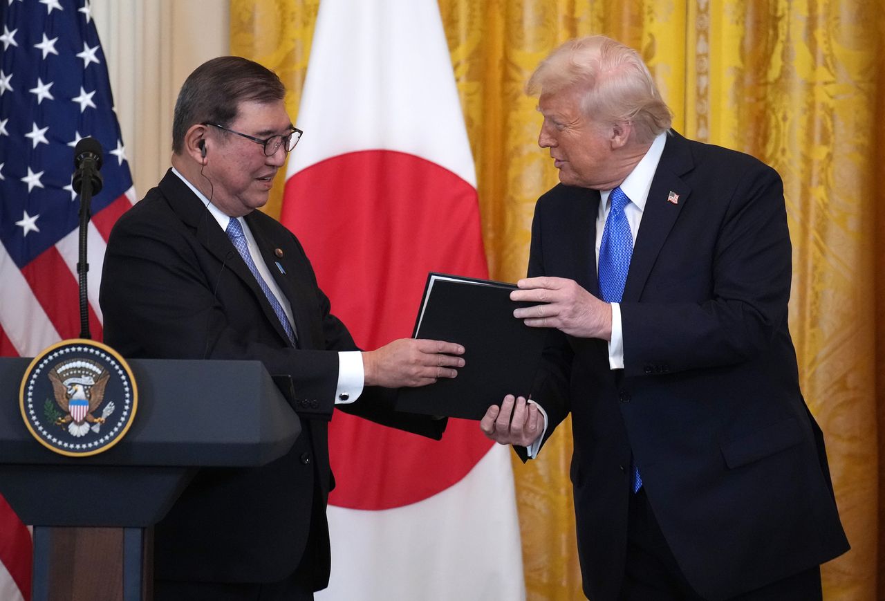 Trump targets Japan trade gap, hints at tariffs or LNG deal