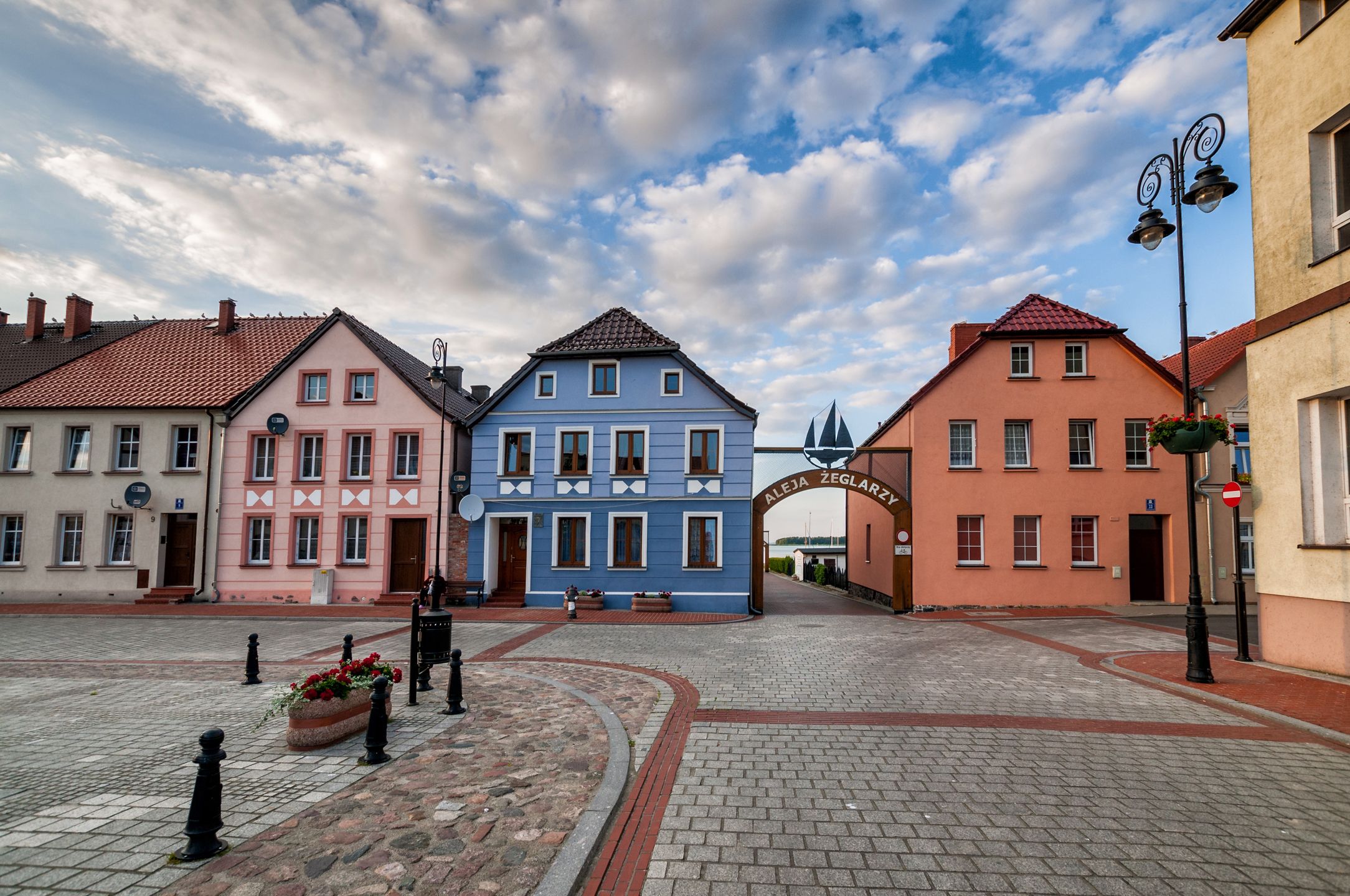 Tenement houses at the Victory Square. Nowe Warpno, West Pomeranian Voivodeship, Poland.
Tenement houses at the Victory Square. Nowe Warpno, West Pomeranian Voivodeship, Poland.
europe, european, poland, polish, tourism, place, places, destination, destinations, sightseeing, day, outside, summer, building, buildings, sky, west pomeranian, voivodeship, voivodeship west pomeranian, city, town, nowe warpno, view, surroundings, architecture, monument, monuments, monumental, tenement house, tenement houses, colorful, street, blue, pink, victory square, europe, european, poland, polish, tourism, place, places, destination, destinations, sightseeing, day, outside, summer, building, buildings, sky, west pomeranian, voivodeship, voivodeship west pomeranian, city, town, nowe warpno, view, surroundings, architecture, monument, monuments, monumental, tenement house, tenement houses, colorful, street, blue, pink, victory square