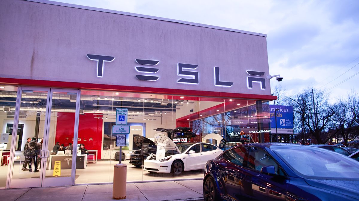 PARAMUS, NEW JERSEY - FEBRUARY 17: Exterior view of a Tesla Service Center on February 17, 2023 in Paramus, New Jersey. Tesla announced that it would, for the first time, open up the use of its charger stations to EVs made by other brands. On Feb. 15, the Biden-Harris Administration announced new plans for the decarbonization of the country's roads by bolstering the EV charging network across the U.S. (Photo by Kena Betancur/VIEWpress via Getty Images)