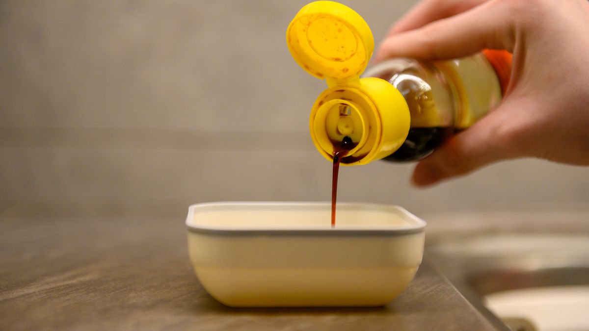 Dripping soy sauce from yellow cap bottleDripping soy sauce from yellow cap bottlechpua