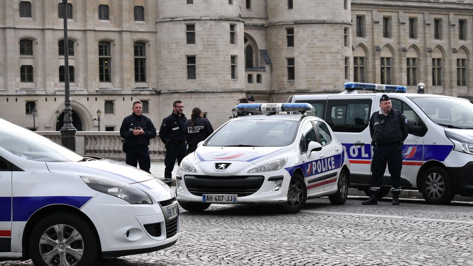 PARIS, FRANCE - OCTOBER 03: Police and military personnel block the bridge near Paris Police headquarters after four officers were killed in a knife attack on October 3, 2019 in Paris, France. A civilian police worker wielding a knife stabbed and killed four officers at the police headquarters before being shot dead.  (Photo by Julien Mattia/Anadolu Agency via Getty Images)