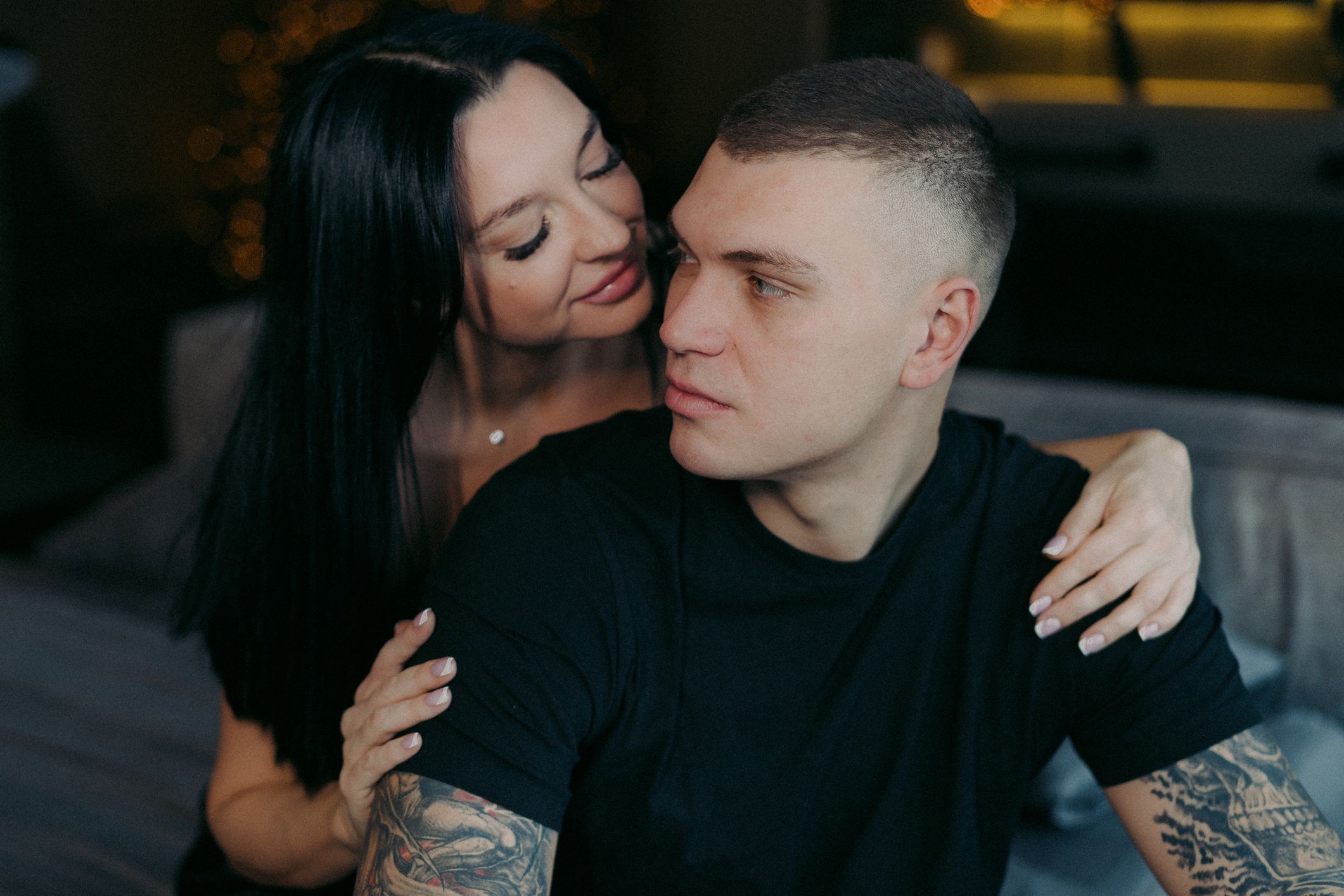 A man and woman sitting on a bed. Young beautiful couple hugging.
A man and woman sitting on a bed. Young beautiful couple hugging. Female embrace male from back. Romantic date or vacation. People in a bedroom or hotel room. Tattoo.
Viktoriia Makarova