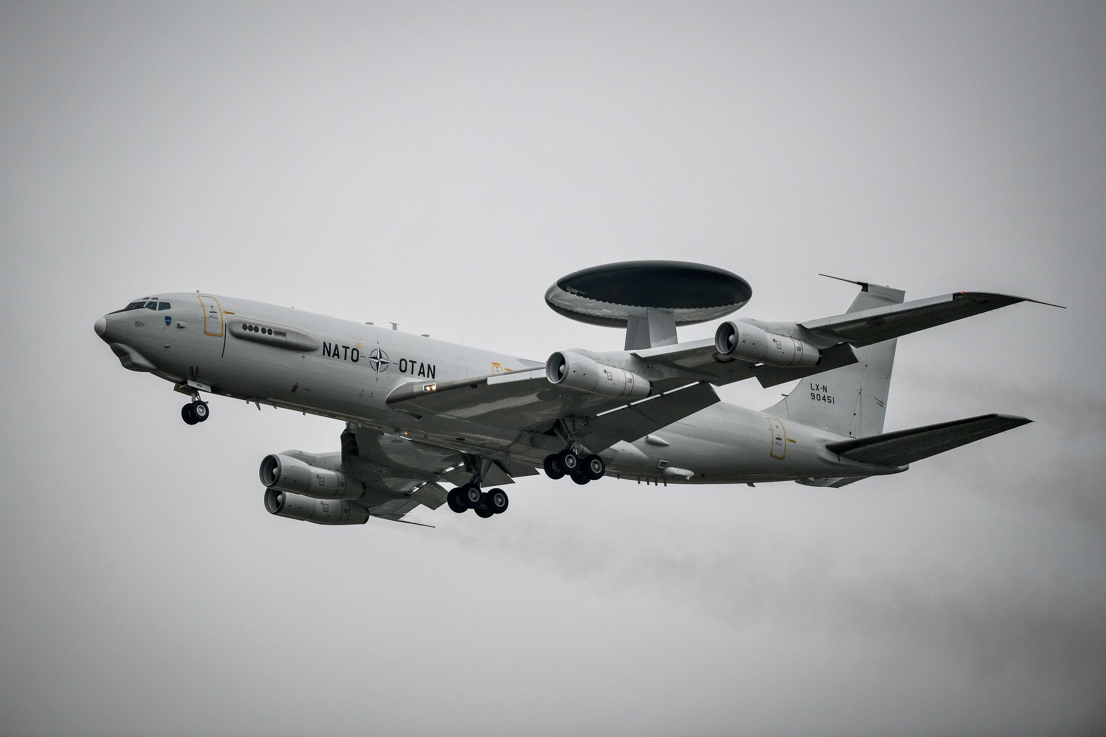 A lone Boeing E-3A Sentry takes to the skies as part of the NATO 70th anniversary flypast as the other aircraft involved in the flypast had to cancel at the Royal International Air Tattoo, RAF Fairford, as bad weather including strong winds, low cloud and rain have grounded many of the planned air displays. (Photo by Ben Birchall/PA Images via Getty Images)