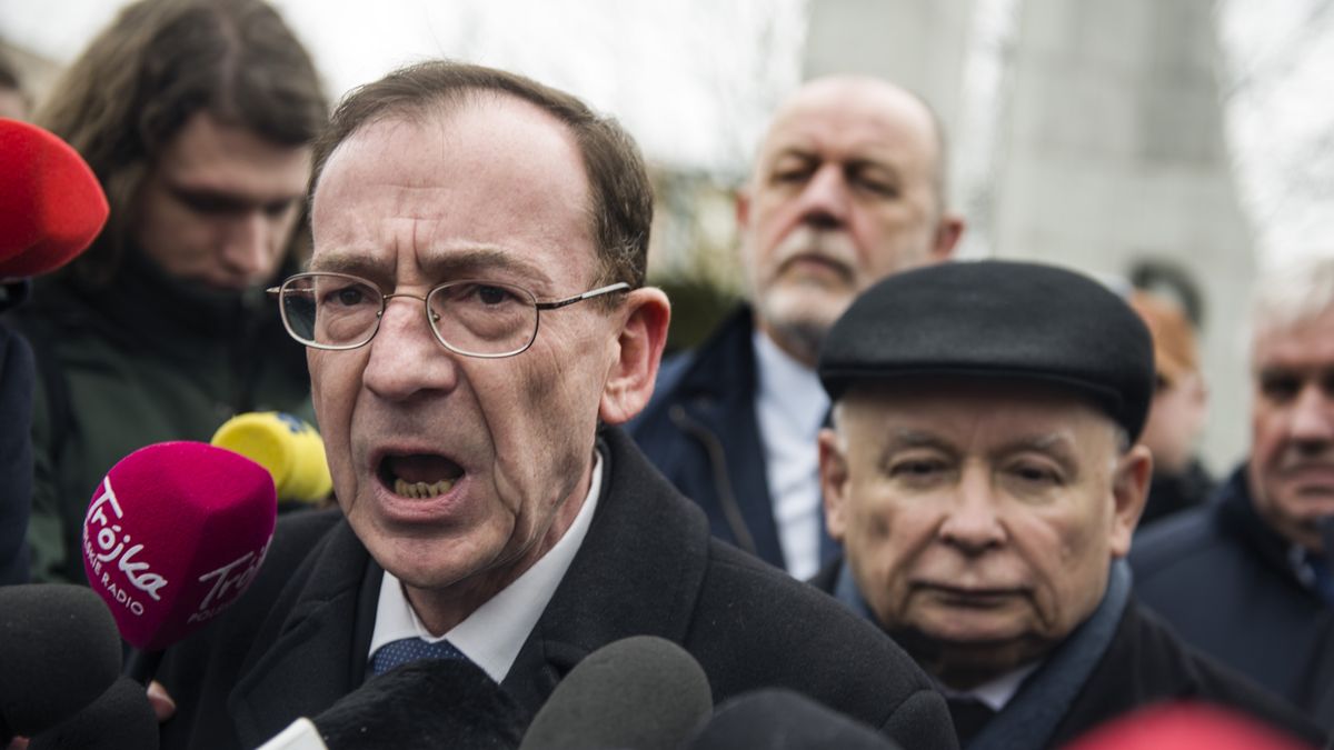 WARSAW, MASOVIAN VOIVODESHIP, POLAND - 2024/02/07: Former Minister of Interior and Administration, Mariusz Kaminski who is released from prison after a second presidential pardon speaks to the media outside the Parliament. Former interior minister, Mariusz Kaminski and his deputy Maciej Wasik were jailed last month after being sentenced for abuse of power for actions taken in 2007, when they served in an earlier Law and Justice-led government and previously led the Central Anti-Corruption Bureau (CBA). They claimed to be "political prisoners" and they also lost their parliamentary mandates.They tried to push their way into parliament, supported by a group of senior Law and Justice (PiS) politicians. President Duda had pardoned both politicians after they were first sentenced in 2015 but Poland's Supreme Court deemed his move invalid, saying a pardon could not be granted before a final ruling in the case was issued. The two politicians were sentenced to two years in prison in December. President Duda pardoned them again in January. (Photo by Attila Husejnow/SOPA Images/LightRocket via Getty Images)