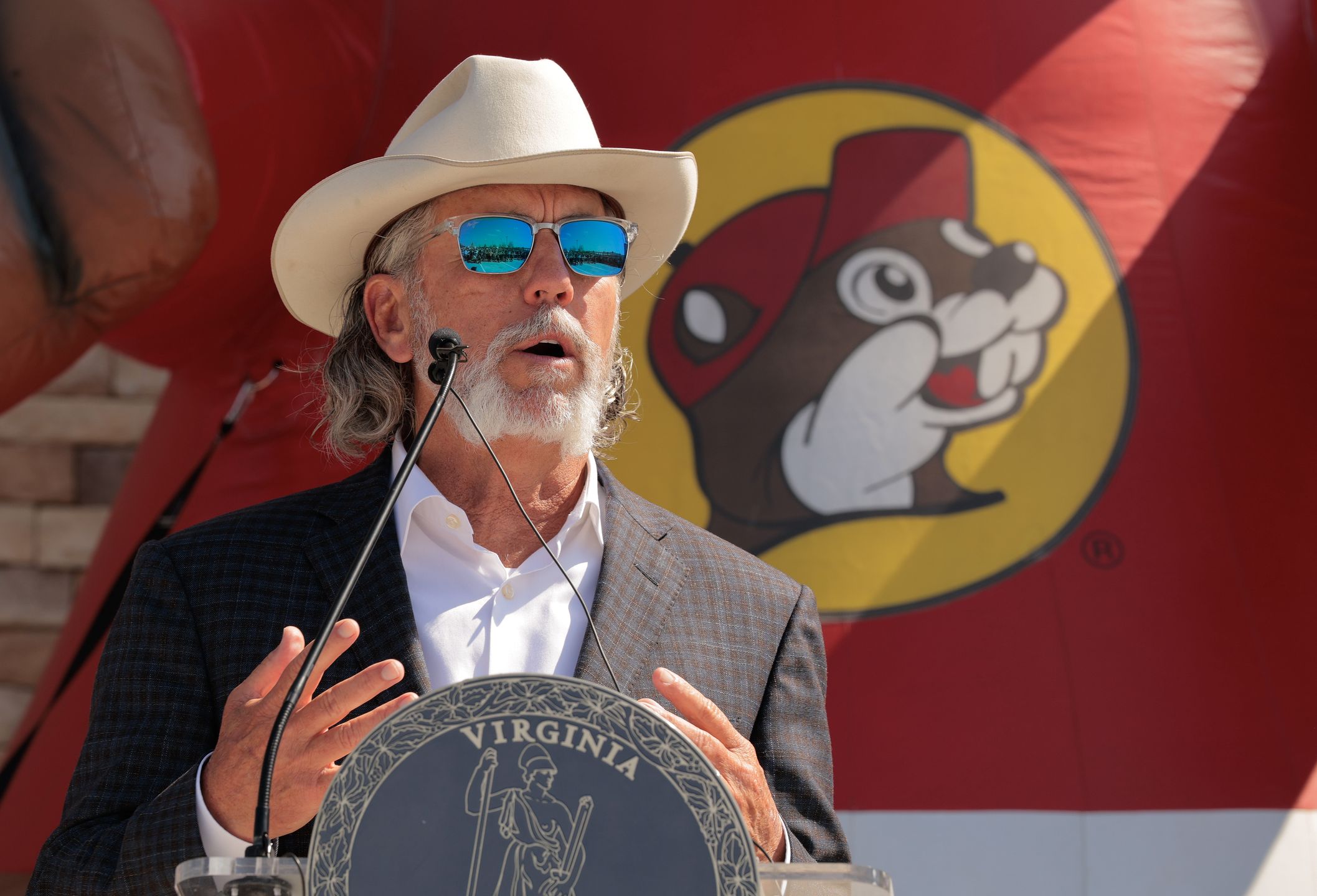 MOUNT CRAWFORD, VIRGINIA - JUNE 30: Buc-ee's co-founder and CEO Arch "Beaver" Aplin III speaks during the grand opening ceremony of the first Buc-ee's location on the East Coast on June 30, 2025 in Mount Crawford, Virginia. This 74,000 square foot mega-convenience store and 120-pump gas station is the Texas-based chain's 69th store and the first to open outside of the southern United States. (Photo by Chip Somodevilla/Getty Images)
