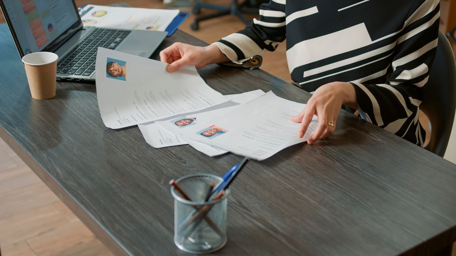 Female HR employee looking at cv resume to hire candidates
Female HR employee looking at cv resume to hire candidates, analyzing information before job interview. Woman using expertise documents to make job offer and recruit applicants. Close up.
close up, cv, resume, curriculum, vitae, documents, papers, files, application, form, search, selection, expertise, hiring, job, interview, work, recruitment, recruit, recruiting, offer, candidate, applicant, recruiter, hr, human, resources, career, appointment, employment, unemployment, vacancy, accept, experience, meeting, woman, employee, manager, worker, business, company, startup, corporate, desk, office, professional, person, executive, brick wall, concept, close up, cv, resume, curriculum, vitae, documents, papers, files, application, form, search, selection, expertise, hiring, job, interview, work, recruitment, recruit, recruiting, offer, candidate, applicant, recruiter, hr, human, resources, career, appointment, employment, unemployment, vacancy, accept, experience, meeting, woman, employee, manager, worker, business, company, startup, corporate, desk, office, professional, person, executive, brick wall, concept