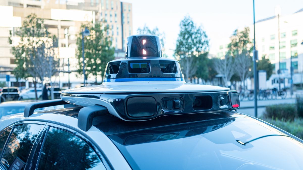 Waymo vehicle with rooftop lidar and sensor array parked on city street, San Francisco, California, December 29, 2025. (Photo by Smith Collection/Gado/Getty Images)