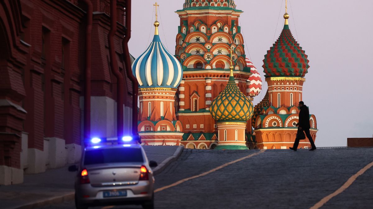 A police car patrols near to Saint Basil's Cathedral on Red square in Moscow, Russia, on Thursday, Feb. 24, 2022. Russian forces attacked targets across Ukraine after President Vladimir Putin ordered an operation to demilitarize the country, prompting international condemnation and threats of further punishing sanctions on Moscow, sending markets tumbling worldwide. Photographer: Andrey Rudakov/Bloomberg via Getty Images