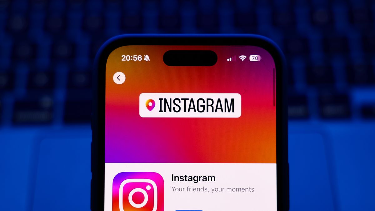 A laptop keyboard and Instagram on App Store displayed on a phone screen are seen in this illustration photo taken in Poland on October 8, 2024. (Photo by Jakub Porzycki/NurPhoto via Getty Images)