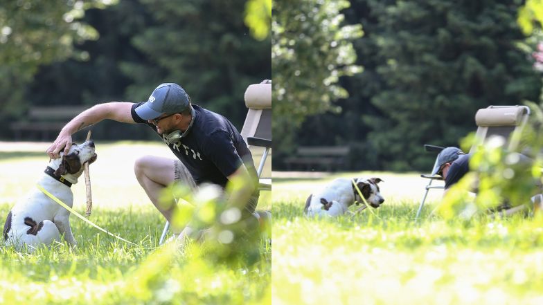 Filip Chajzer relaksuje się w parku