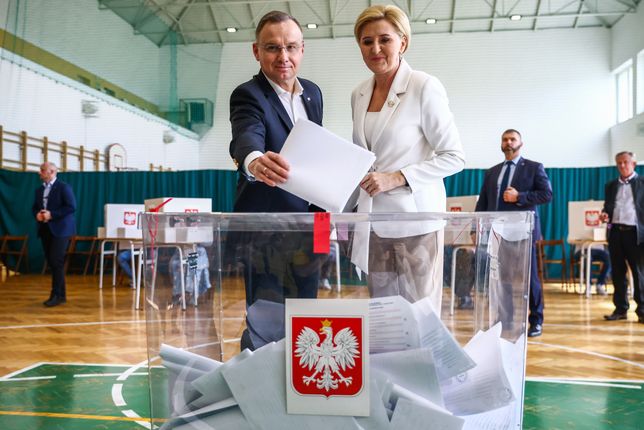 Andrzej Duda, the President of Poland, and his wife, Agata Kornhauser-Duda, cast their ballots at a polling station in Polish local elections on April 7th in Krakow, Poland. (Photo by Beata Zawrzel/NurPhoto via Getty Images)