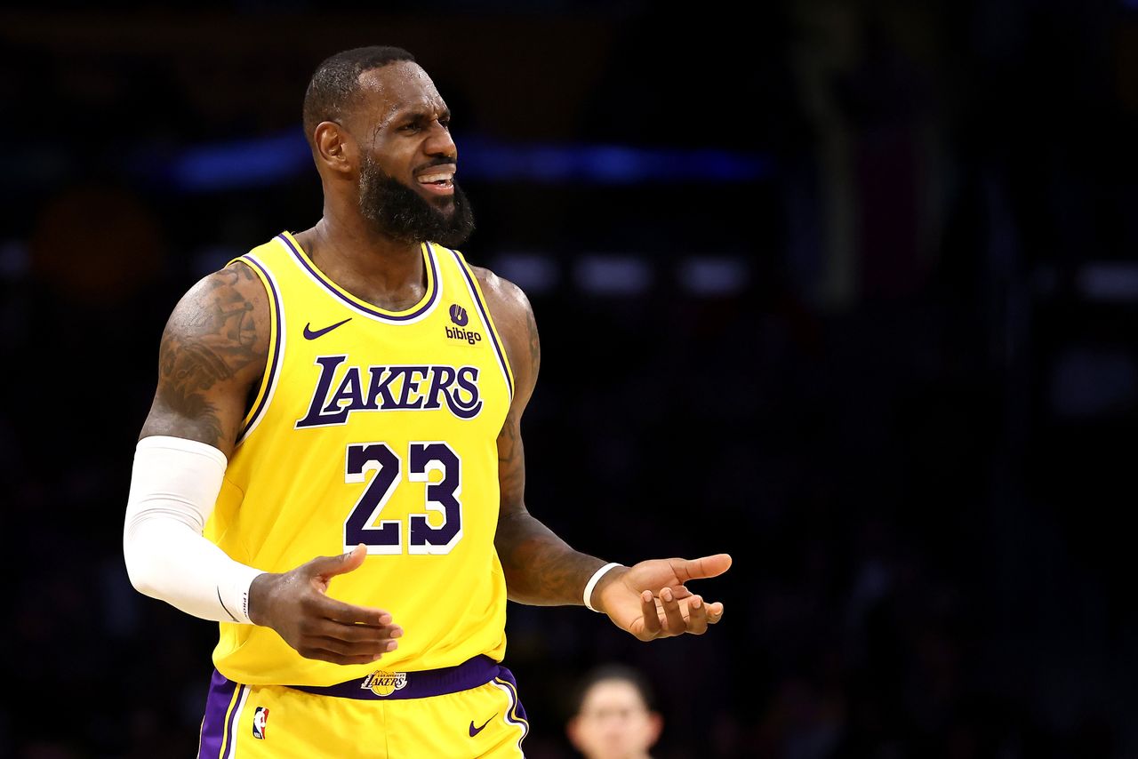 LOS ANGELES, CALIFORNIA - FEBRUARY 13: LeBron James #23 of the Los Angeles Lakers reacts to a play during the third quarter against the Detroit Pistons at Crypto.com Arena on February 13, 2024 in Los Angeles, California. NOTE TO USER: User expressly acknowledges and agrees that, by downloading and or using this photograph, user is consenting to the terms and conditions of the Getty Images License Agreement.  (Photo by Katelyn Mulcahy/Getty Images)