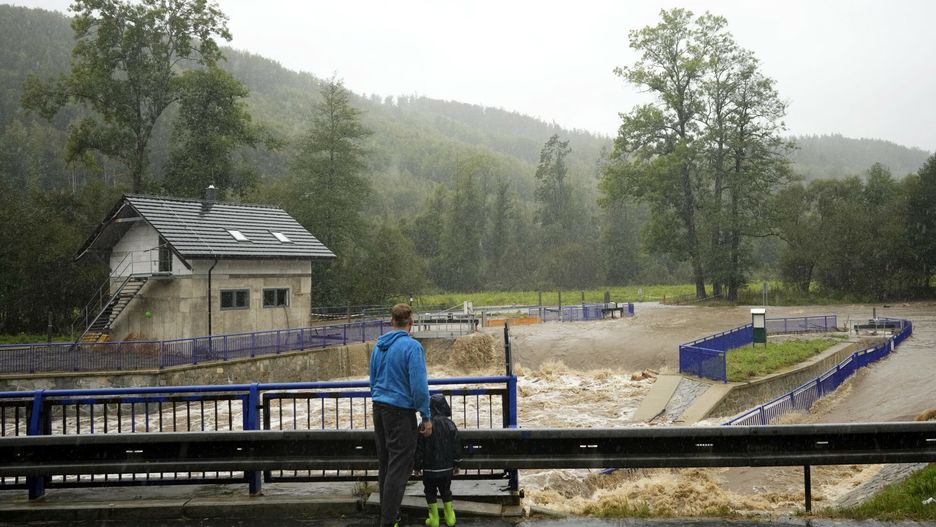 Temporary
Residents watch the rising levels of the Opava river near Brantice, Czech Republic, Saturday, Sept. 14, 2024. (AP Photo/Petr David Josek)
Petr David Josek