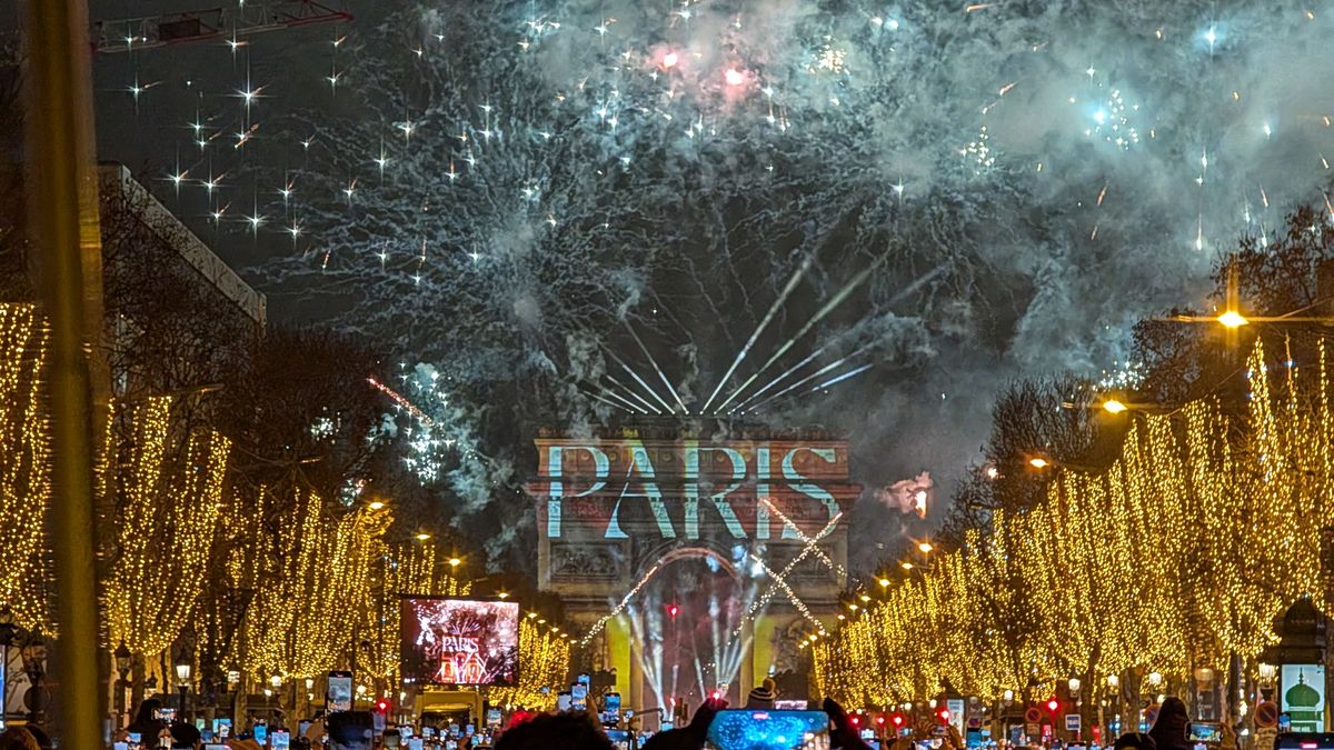 PARIS, FRANCE - JANUARY 1: Fireworks and light shows are held at the Champs-Elysees during the New Year celebrations in Paris, France on January 1, 2025. (Photo by Luc Auffret/Anadolu via Getty Images)