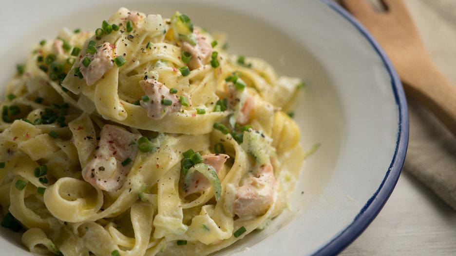 Tagliatelle pasta dish with salmon and zucchini