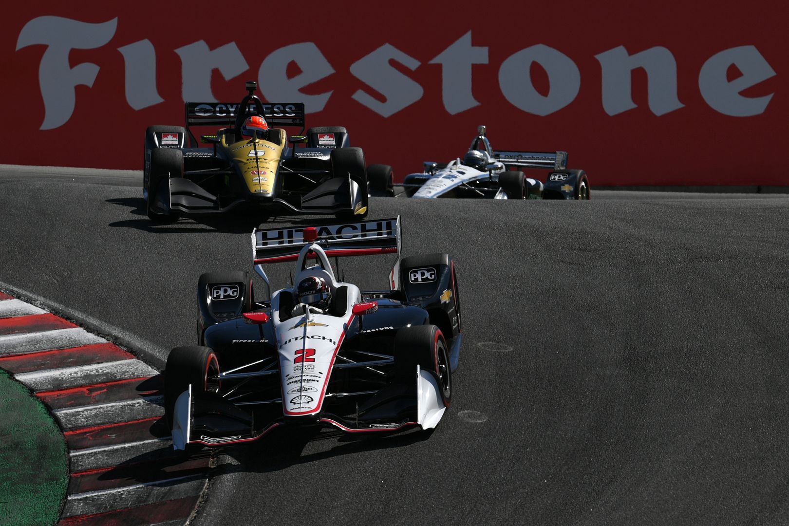 MONTEREY, CALIFORNIA - SEPTEMBER 22: Josef Newgarden #2 of United States and Hitachi Team Penske Chevrolet leads James Hinchcliffe #5 of United States and Arrow Schmidt Peterson Motorsports Honda during the NTT IndyCar Series Firestone Grand Prix of Monterey at WeatherTech Raceway Laguna Seca on September 22, 2019 in Monterey, California. (Photo by Robert Reiners/Getty Images)
