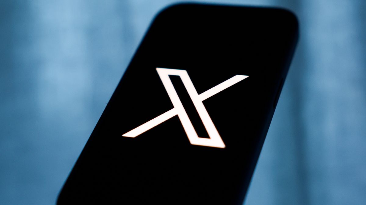 X logo displayed on a phone screen is seen in this illustration photo taken in Krakow, Poland on December 23, 2025. (Photo by Jakub Porzycki/NurPhoto via Getty Images)