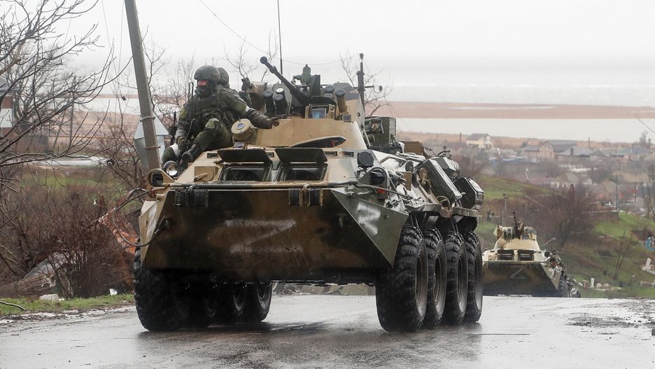 Service members of pro-Russian troops ride an armoured personnel carrier in MariupolService members of pro-Russian troops ride an armoured personnel carrier during Ukraine-Russia conflict on a rainy day in the southern port city of Mariupol, Ukraine April 13, 2022.,Image: 682602052, License: Rights-managed, Restrictions: , Model Release: no, Credit line: ALEXANDER ERMOCHENKO / Reuters / ForumALEXANDER ERMOCHENKO / Reuters / Forumwar, category_code_europ, category_code_war