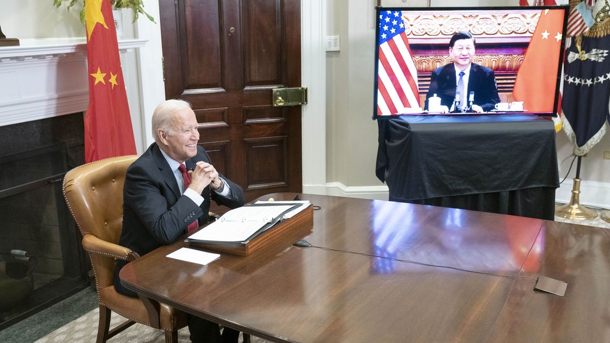 U.S. President Joe Biden reacts while meeting virtually with Xi Jinping, China's president, in the Roosevelt Room of the White House in Washington, D.C., U.S., on Monday, Nov. 15, 2021. With trade, Taiwan and China's economic practices on the agenda, the U.S. is hoping to put "guardrails" on the relationship so things don't worsen. Photographer: Sarah Silbiger/UPI/Bloomberg via Getty Images